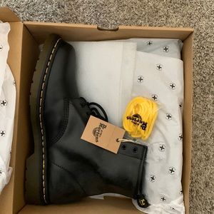 Brand new, never been worn Dr. Martens 1460.  Black leather.